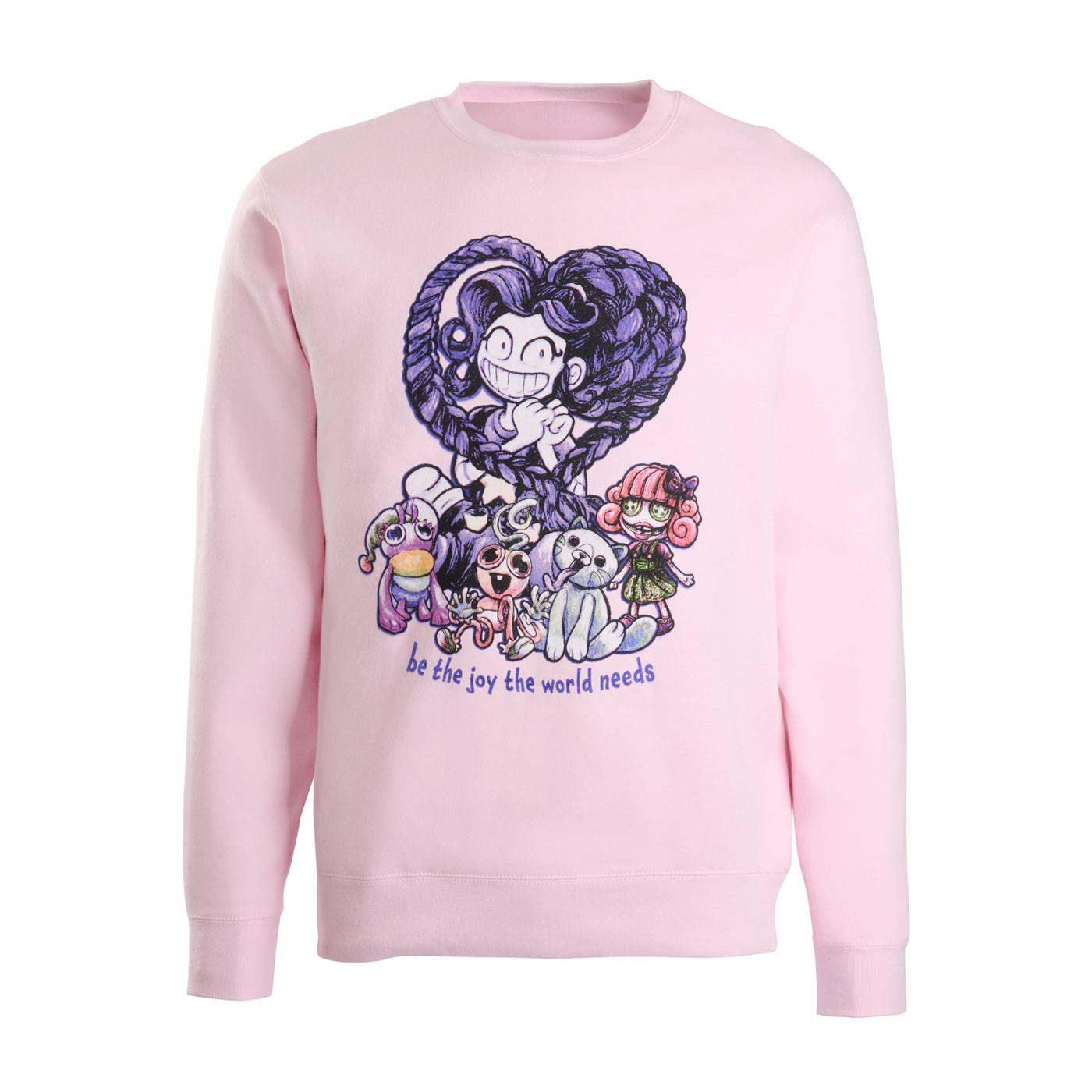 A light pink crewneck sweatshirt featuring a colorful graphic print of a cartoon character and several small characters below, with the text 'be the joy the world needs' printed underneath.