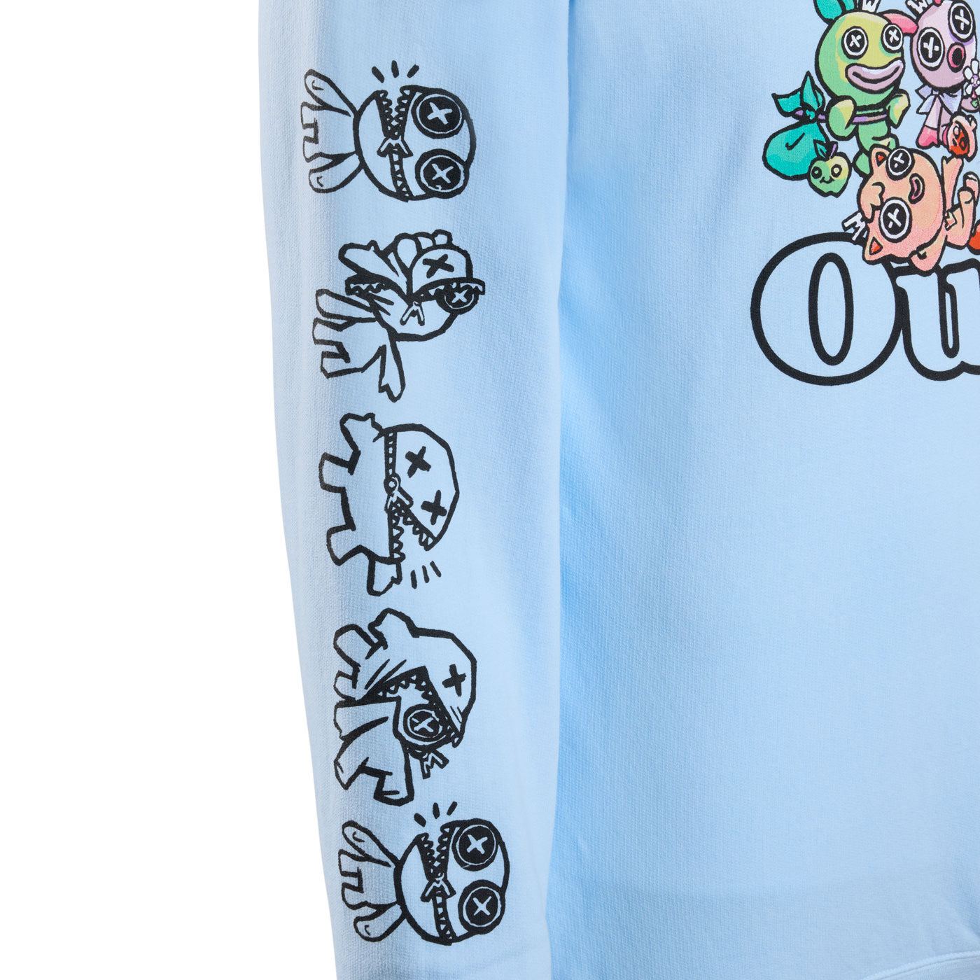 A close-up of a light blue graphic sweatshirt sleeve featuring a vertical black line of outimal characters as they transform.