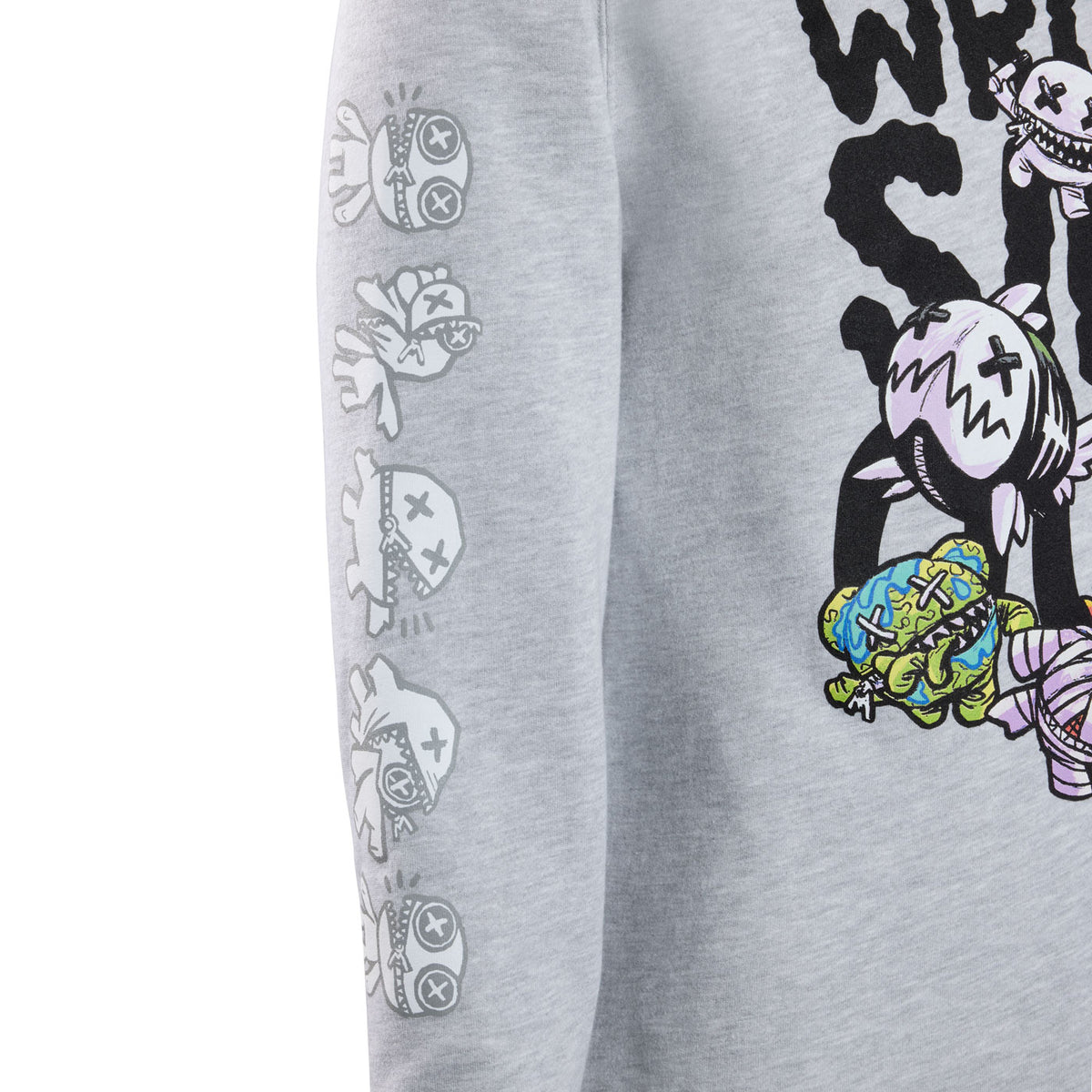 A close-up of a grey sweatshirt right sleeve featuring a vertical black line of outimal characters as they transform.