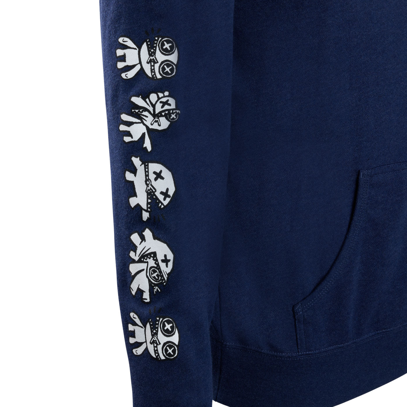 A close-up of a navy blue sleeve featuring a vertical black line of outimal characters as they transform.