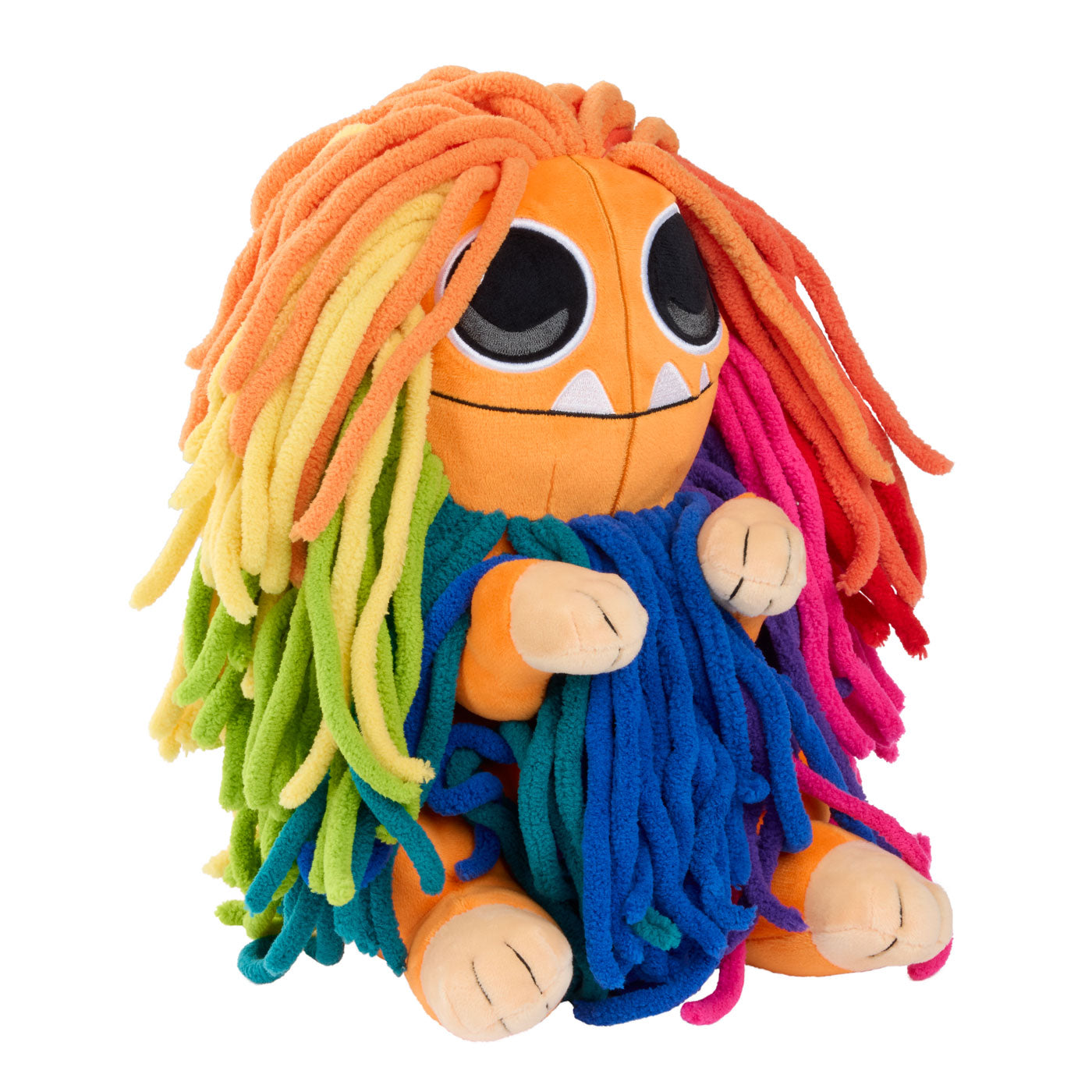 A colorful plush toy with an orange round head, large black eyes, small white teeth, and long fuzzy yarn-like hair and clothing in rainbow colors including yellow, green, blue, pink, and red.