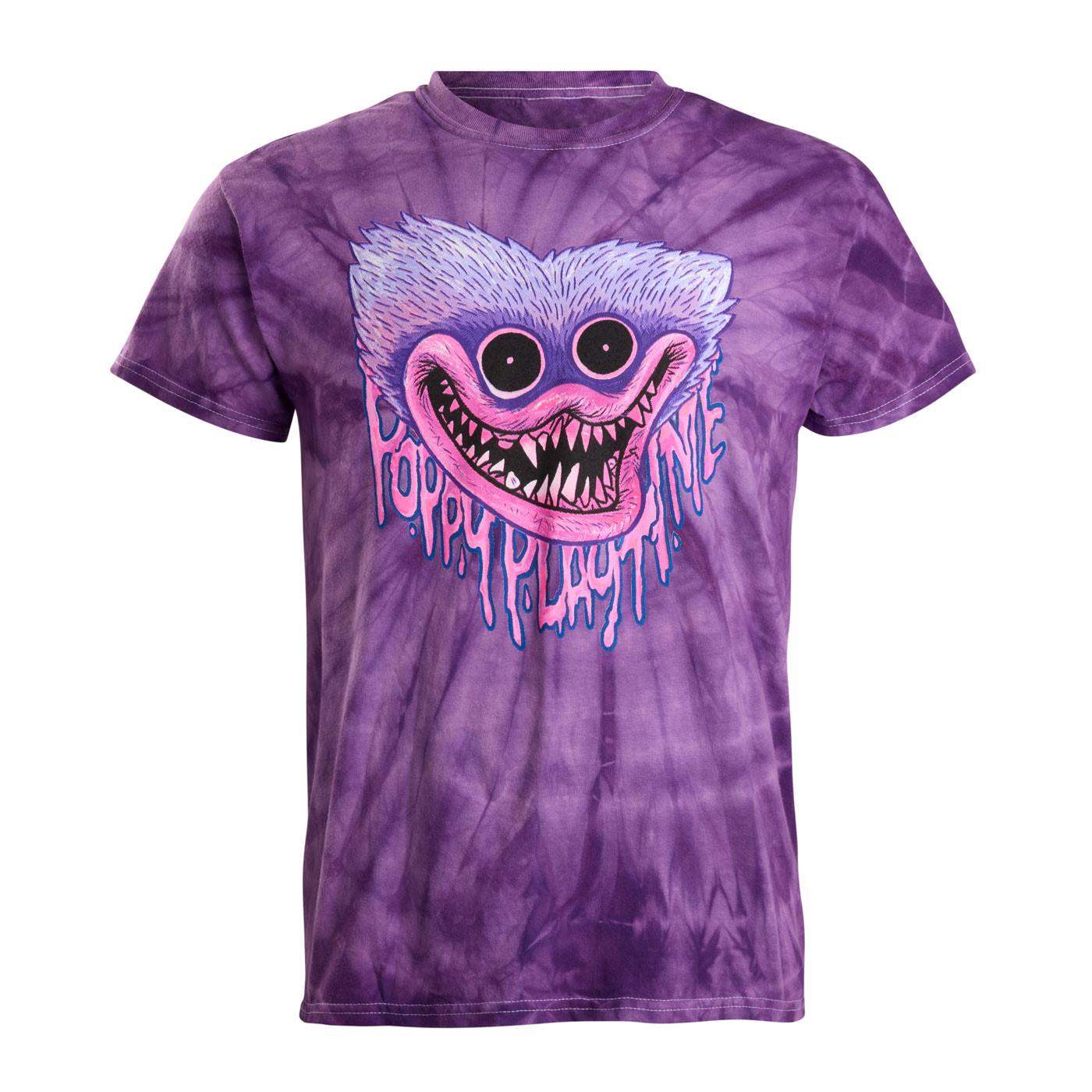 A purple tie-dye short-sleeve t-shirt featuring a large graphic of a huggy wuggy monster face with the text 'Poppy Playtime' in dripping pink and blue letters.