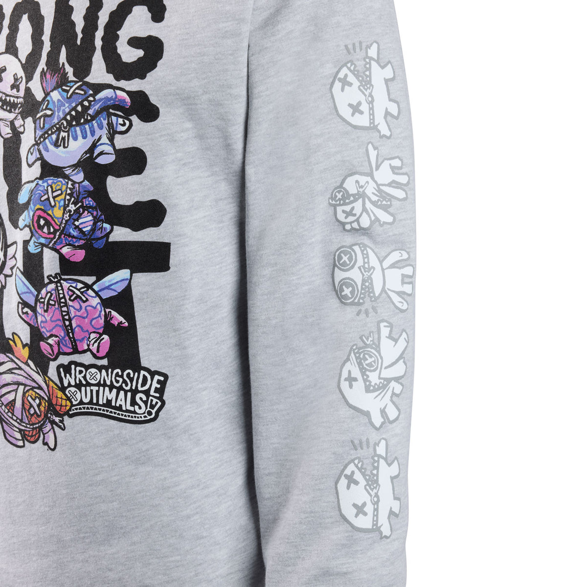 A close-up of a grey sweatshirt left sleeve featuring a vertical black line of outimal characters as they transform.