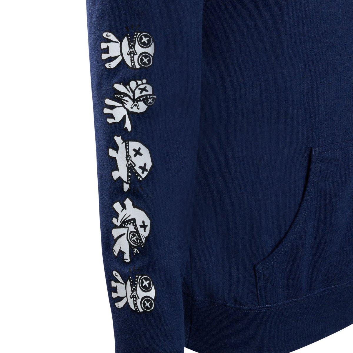 A close-up of a navy blue sleeve featuring a vertical black line of outimal characters as they transform.