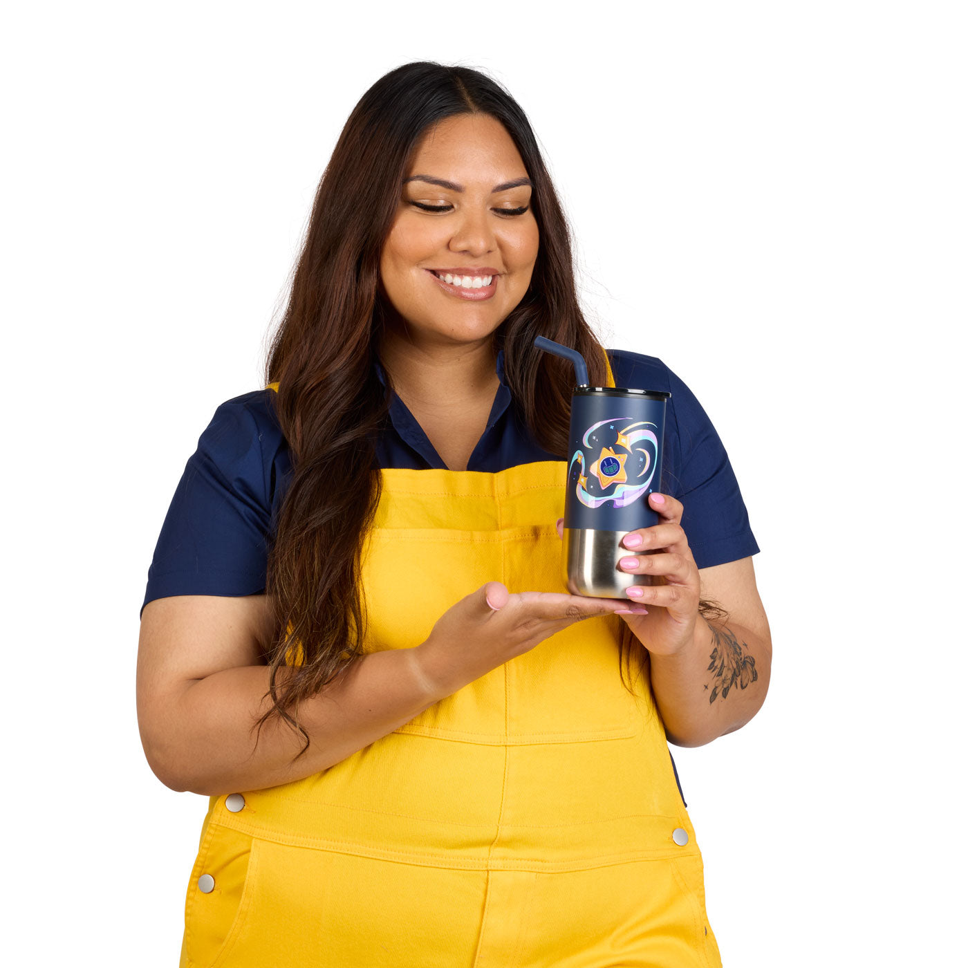 Model holding a navy tumbler with a Glowby design at the center.